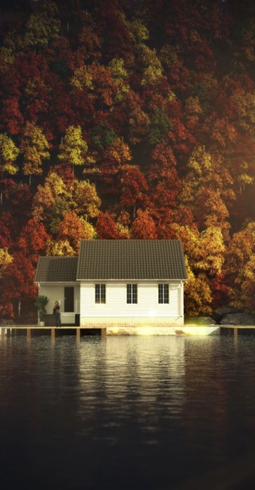 cottage on the lake in autumn.